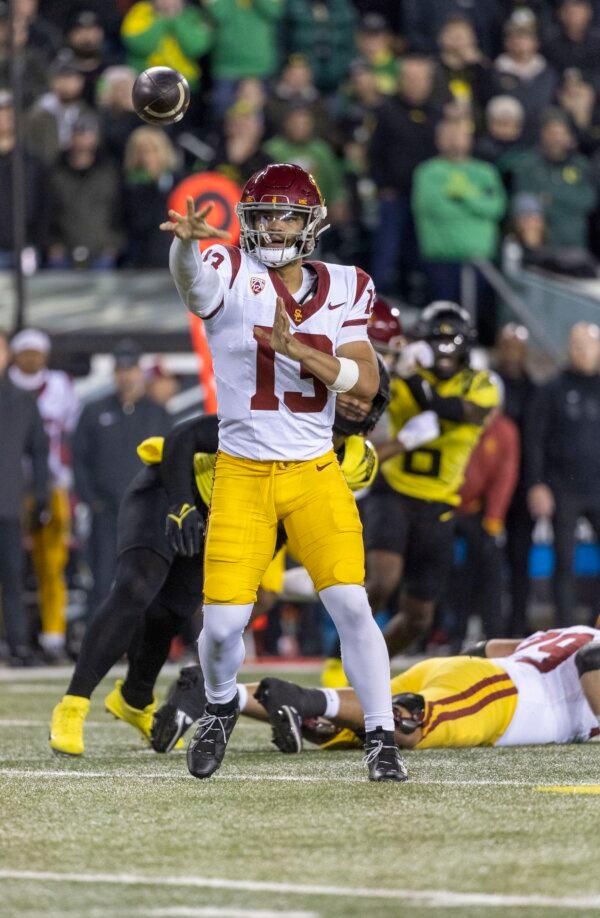 Quarterback Caleb Williams (13) of the USC Trojans passes the ball during the first half against the Oregon Ducks in Eugene, Ore., on Nov. 11, 2023. (Tom Hauck/Getty Images)