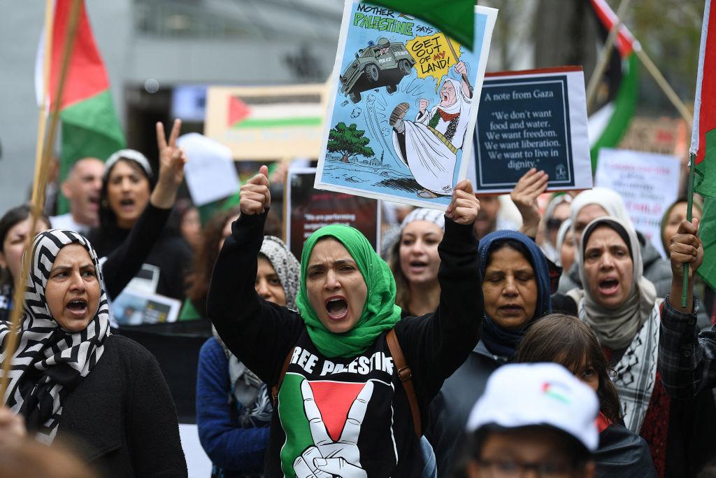 Pro-Palestinian Protestors Spray Fake Blood on US Consulate