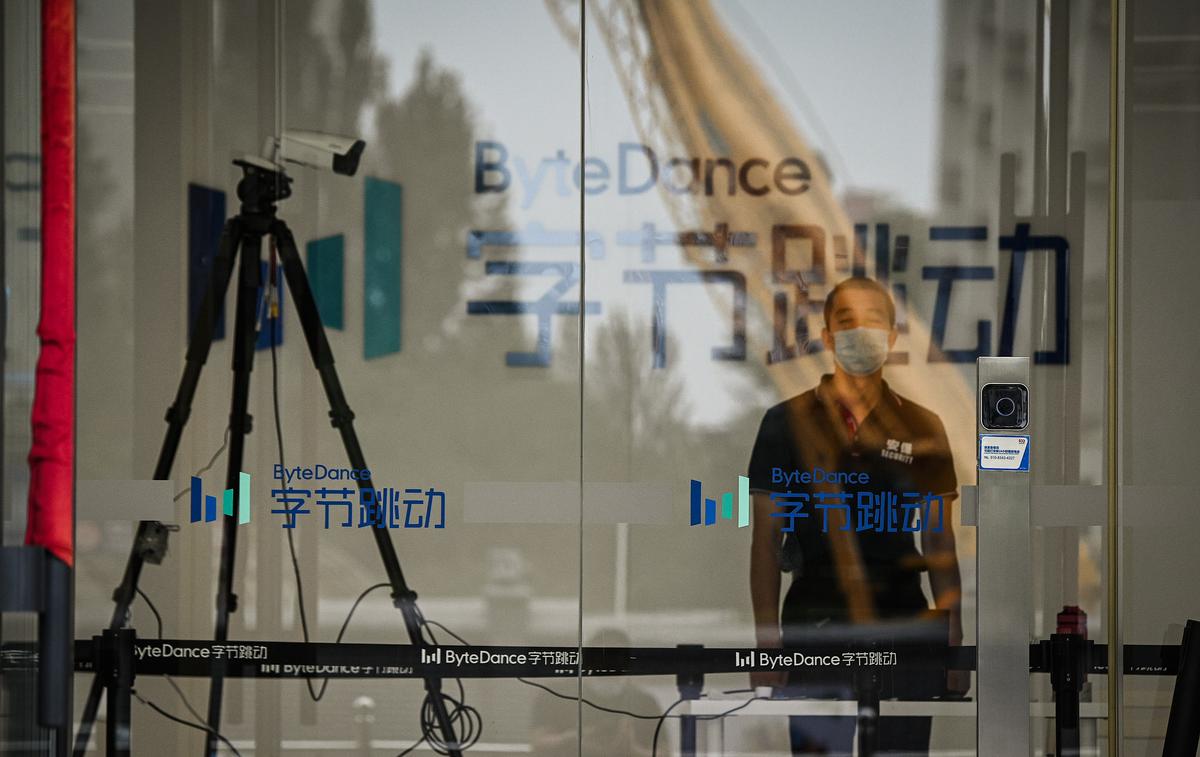 A security guard stands at the entrance of the headquarters of ByteDance, the owner of video sharing app TikTok, in Beijing on Aug. 5, 2020. (Noel Celis/AFP via Getty Images)