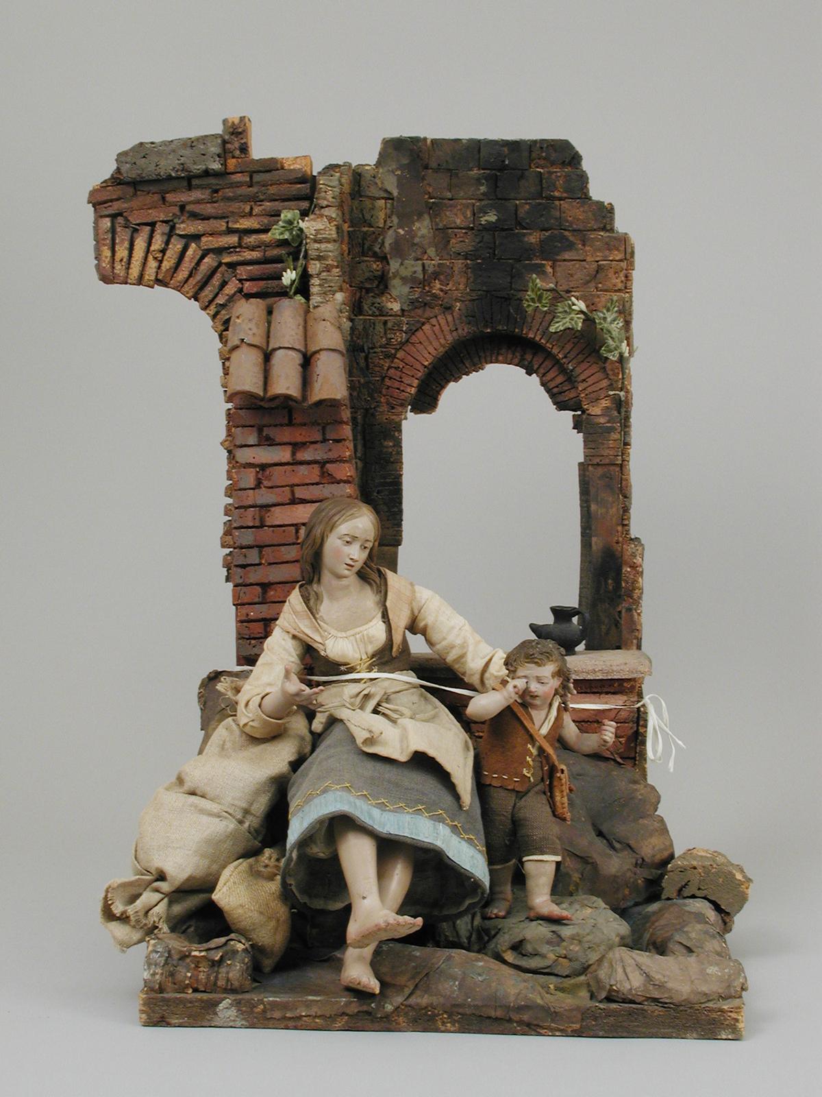 Mother and child on background, late 18th–early 19th century, Naples. Polychromed wood and terra cotta, cloth, straw, leather, metal, paper, cork. Gift of Loretta Hines Howard, The Metropolitan Museum of Art, New York City. (Public Domain)