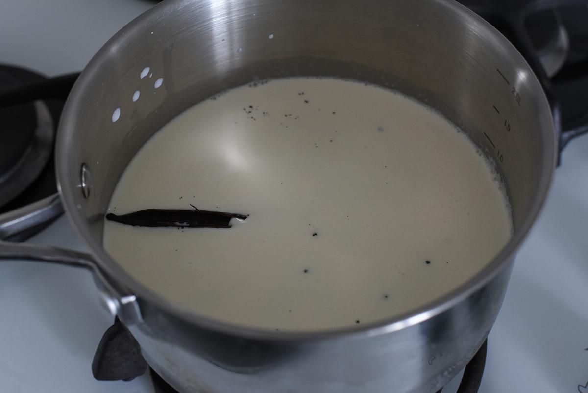 While the dough rests, infuse the milk and cream with the vanilla bean seeds. (Audrey Le Goff)