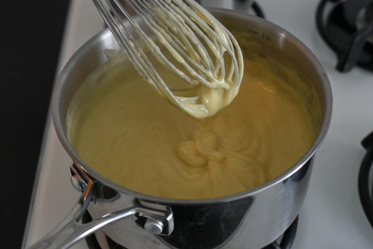 While the crust rests again, prepare the custard; it should reach a thick, creamy consistency. (Audrey Le Goff)