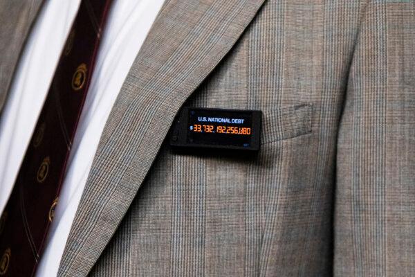 Rep. Thomas Massie (R-Ky.) wears a pin tracking the U.S. National Debt in Washington on Nov. 14, 2023. (Anna Rose Layden/Getty Images)
