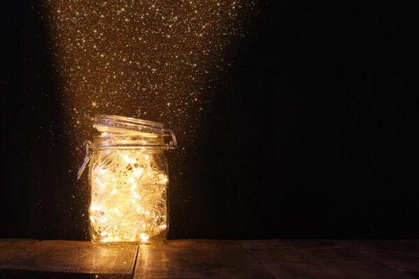 Fairy lights add some Christmas magic to the table. (tomertu/Shutterstock)