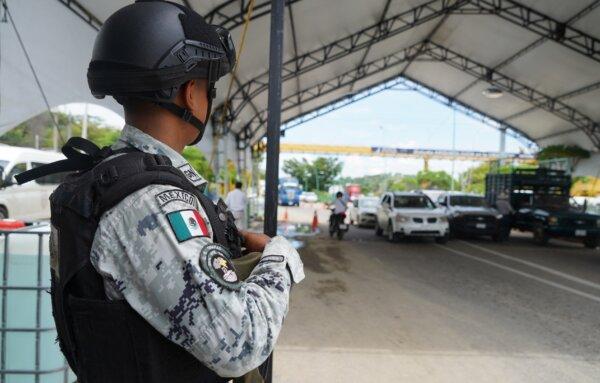 A member of the Mexican National Guard at a checkpoint near a protest for the release of a group of kidnap victims in Chiapa de Corzo, Mexico, on June 29, 2023. (Raul Mendoza/AFP via Getty Images)