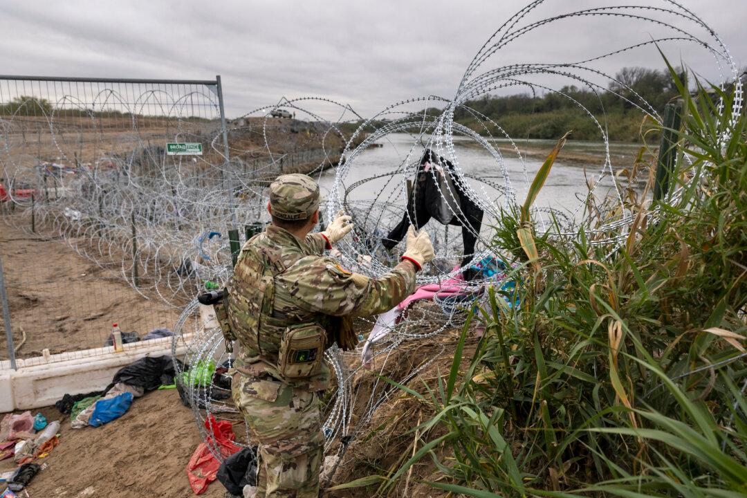 Biden Admin Urges Supreme Court to Let CBP Agents Remove Razor Wire on Southern Border