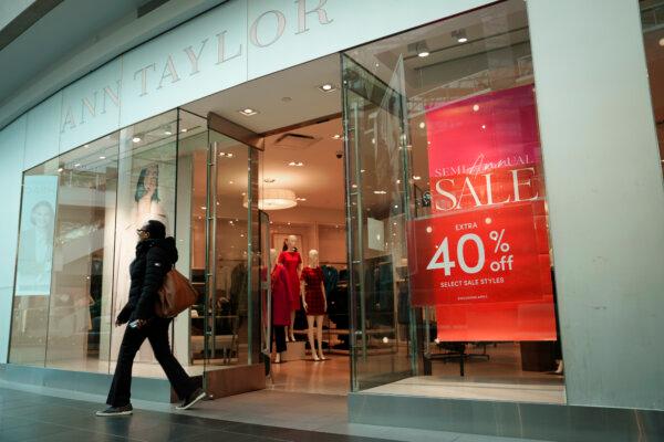 Sales advertisement at a shop in the Fashion Centre at Pentagon City shopping mall in Arlington, Va., on Jan 3, 2024. (Madalina Vasiliu/The Epoch Times)