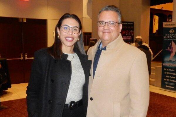 Dalmo Mello (R) and his wife enjoyed Shen Yun at The Hanover Theatre in Worcester, Mass., on Jan. 13, 2024. (Weiyong Zhu/The Epoch Times)