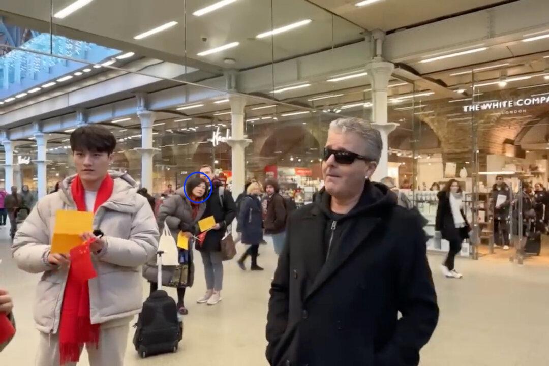 Suspected Chinese Agent Among Group Which Clashed With British Pianist