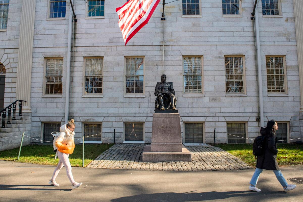 People walk through Harvard Yard at Harvard University in Cambridge, Mass., on Dec. 12, 2023. (Joseph Prezioso/AFP)