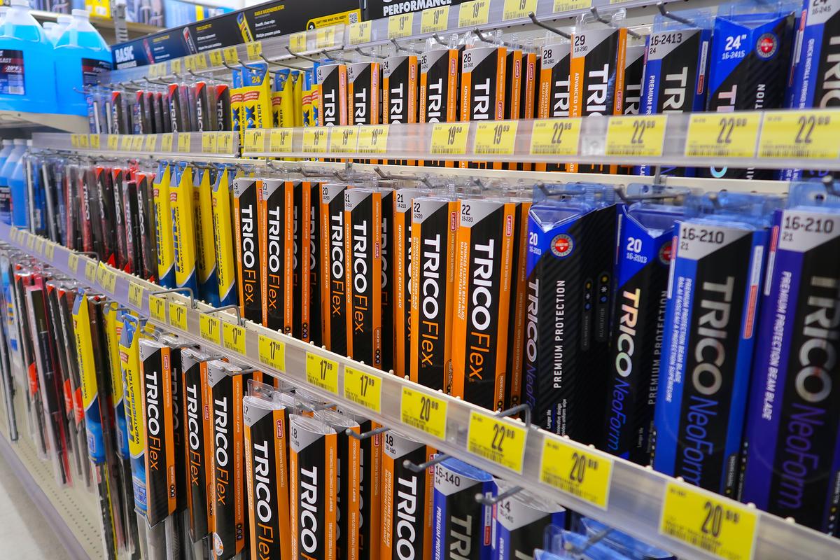 Most auto parts stores and big box retailers offer a wide selection of replacement windshield wiper blades, with a handy guide to ensure the right fit. (Red Herring/Shutterstock)