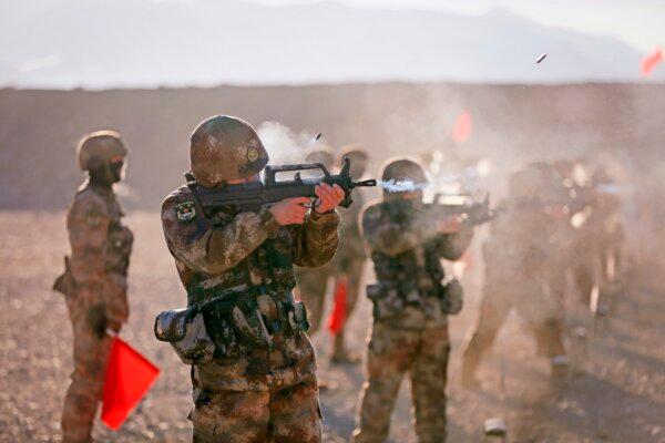 Chinese People's Liberation Army (PLA) soldiers take part in military training at the Pamir Mountains in Kashgar, northwestern China's Xinjiang region, on Jan. 4, 2021. (STR/AFP via Getty Images)