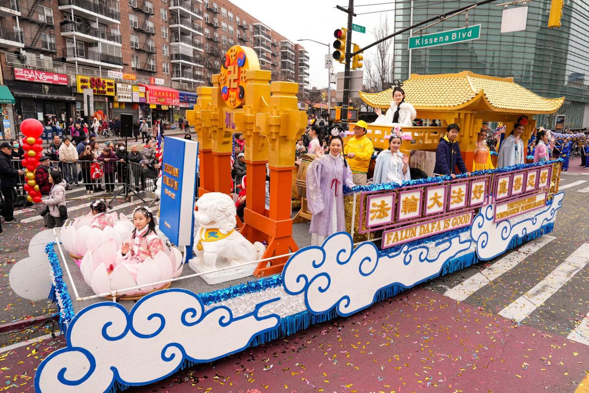 Falun Gong practitioners attend a parade celebrating the Chinese New Year in the Flushing neighborhood of Queens, N.Y., on Feb. 10, 2024. (Larry Dye/The Epoch Times)