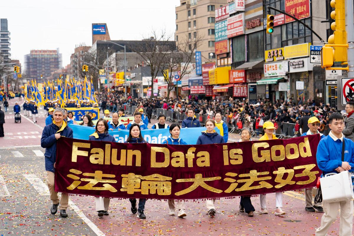 Falun Gong practitioners attend a parade celebrating the Chinese New Year in the Flushing neighborhood of Queens, N.Y., on Feb. 10, 2024. (Samira Bouaou/The Epoch Times)