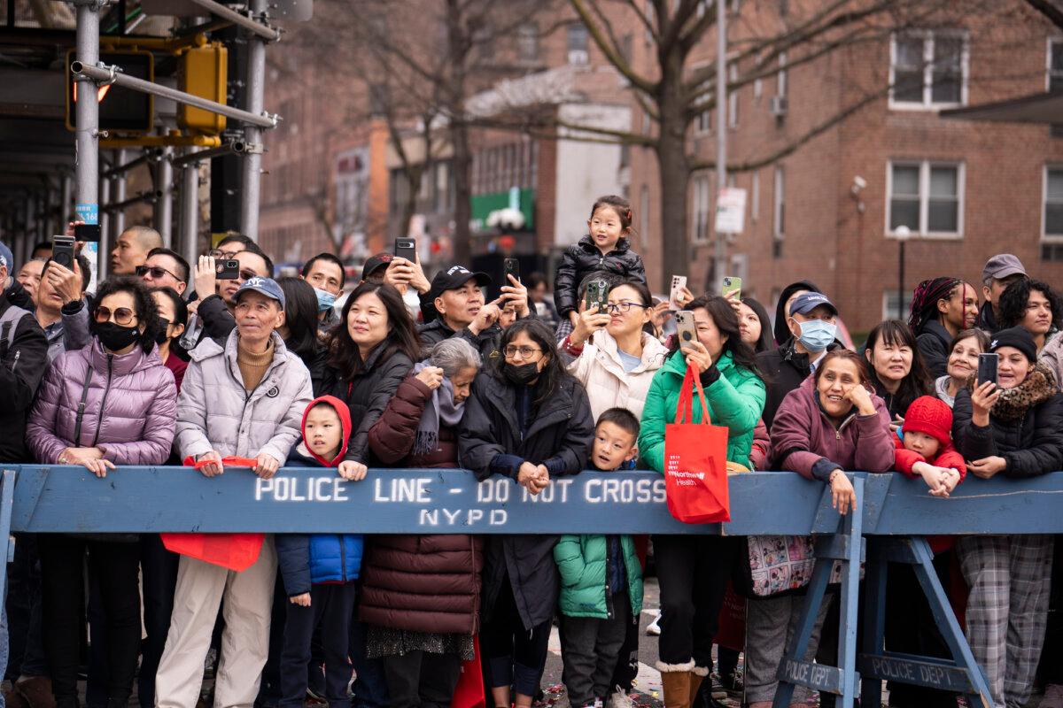 Falun Gong practitioners attend a parade celebrating the Chinese New Year in the Flushing neighborhood of Queens, N.Y., on Feb. 10, 2024. (Samira Bouaou/The Epoch Times)