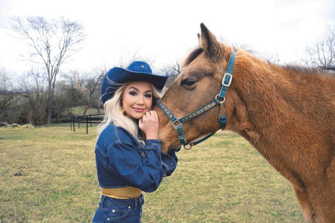 Country Singer RaeLynn Is Not Afraid to Let You Know She Loves Her Country, Family, and Faith Fiercely