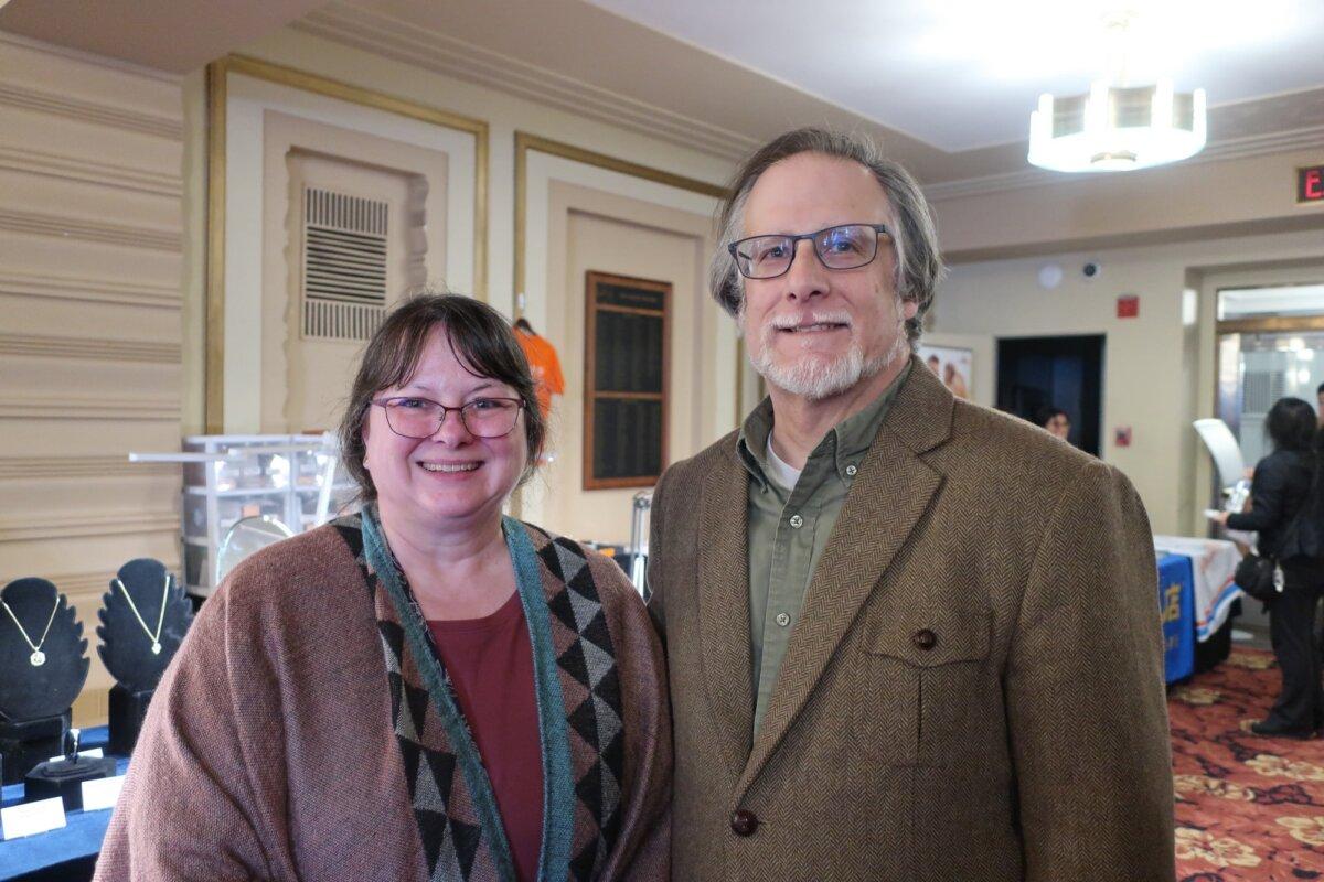 Robert Christopher (R) attended Shen Yun's evening show at the Adler Theatre on Feb. 27, 2024. (Stacey Tang/The Epoch Times)