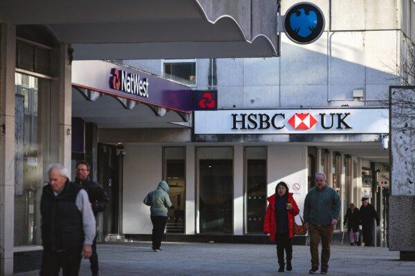 People walk past branches of HSBC, Natwest, and Barclays banks in Bracknell town centre, England, on Jan. 10, 2024. (Adrian Dennis/AFP via Getty Images)