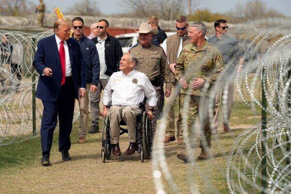 Republican presidential candidate former President Donald Trump talks with Texas Gov. Greg Abbott during a visit to the U.S.–Mexico border on Feb. 29, 2024, in Eagle Pass, Texas. (Eric Gay/AP Photo)