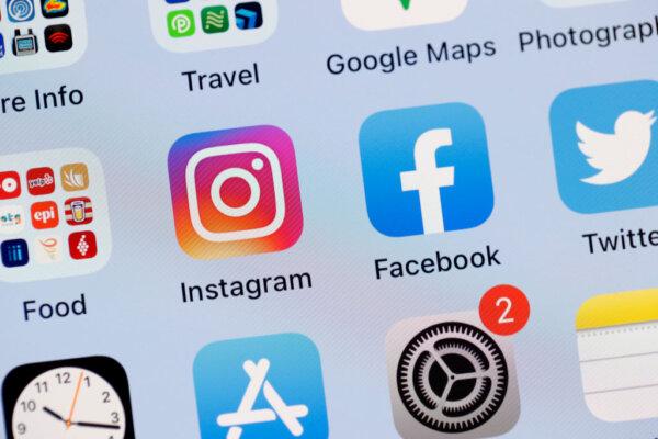 In this photo illustration, the Facebook and Instagram apps are seen on the screen of an iPhone in San Anselmo, Calif., on Oct. 4, 2021. (Justin Sullivan/Getty Images)