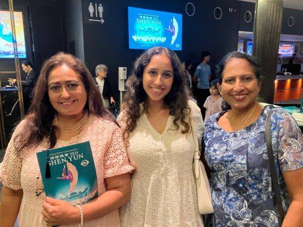 Ragini Sood (C) attends Shen Yun Performing Arts with her family at the Capitol Theatre in Sydney, Australia, on March 9, 2024. (Melanie Sun/The Epoch Times)