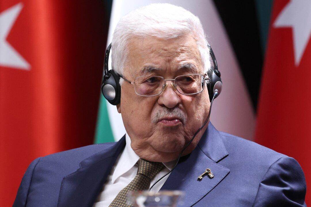 Palestinian Leader Appoints Longtime Adviser as Prime Minister in Face of Calls for Reform