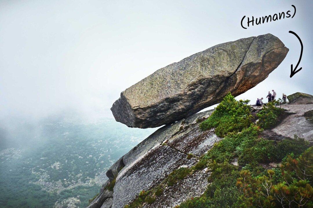 Ginormous 500-Ton ‘Hanging Rock’ Defies Gravity, Clinging to Cliff in Russia for Over 100,000 Years