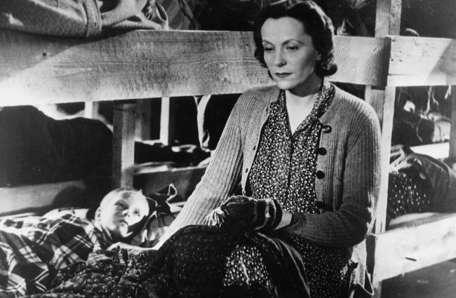 Hanna Malik (Jarmila Novotna) reads to her son Karel (Ivan Jandl), in “The Search.” (Metro-Goldwyn-Mayer)