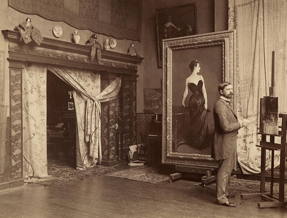 John Singer Sargent in his Paris studio with the "Portrait of Madame X," circa 1885, photographed by Adolphe Giraudon. (Public Domain)
