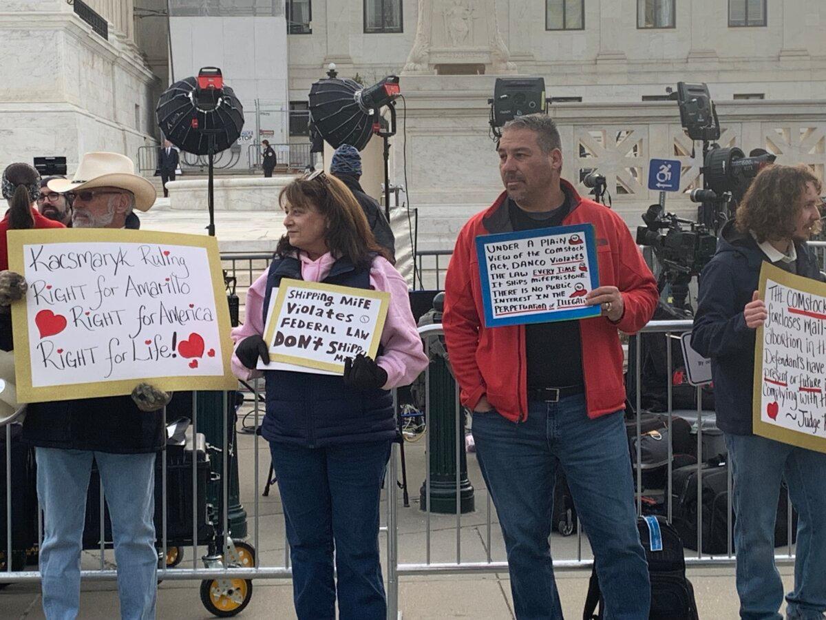 Pro-life protesters outside the Supreme Court before the major challenge to abortion pill access on March 26, 2024. (Sam Dorman/The Epoch Times)