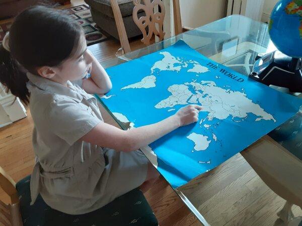 Ms. Huffman's students use unlabeled maps to memorize the countries and their locations. (Courtesy of Rebecca Huffman)