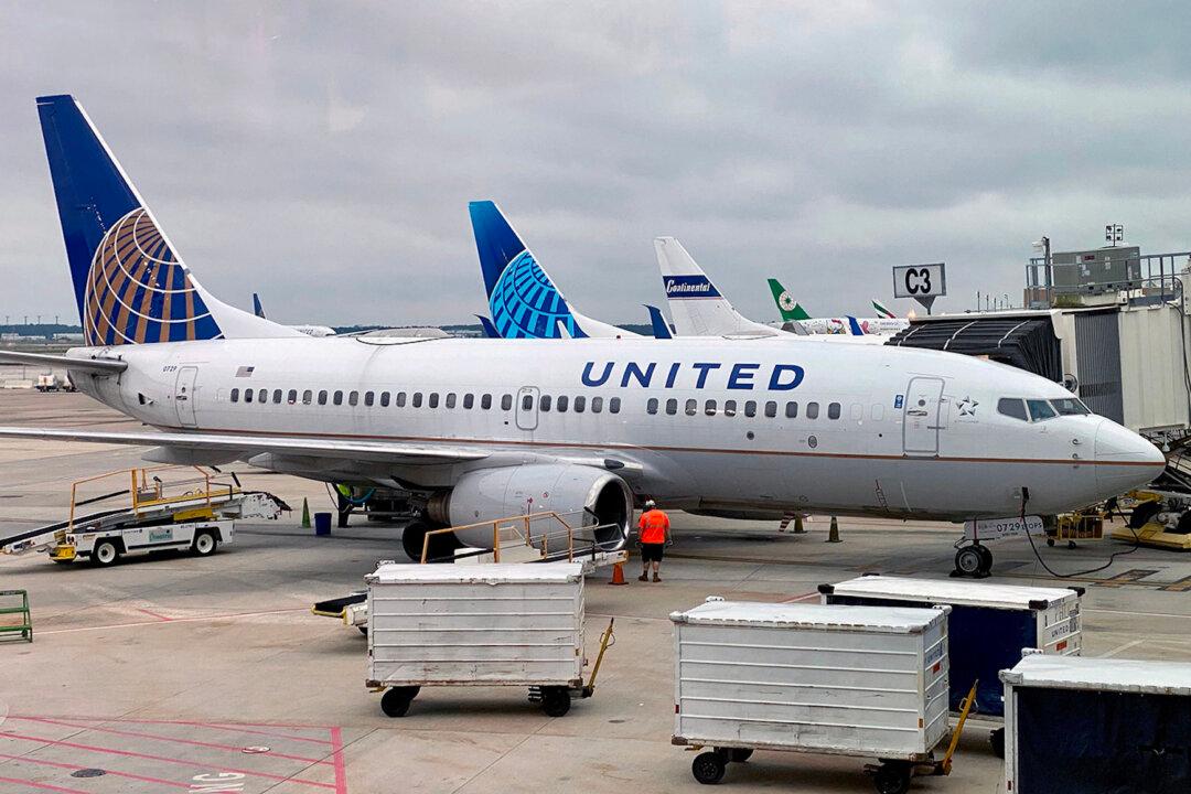 Two Passengers Injured as United Airlines Plane Maneuvered to Avoid Collision