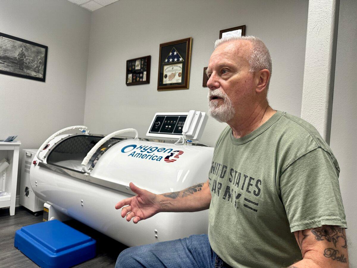 Retired Army Col. Mikel Burroughs discusses ways to reduce veteran suicides through hyperbaric treatments in Huntsville, Texas, on April 1, 2024. (Darlene McCormick Sanchez/The Epoch Times)