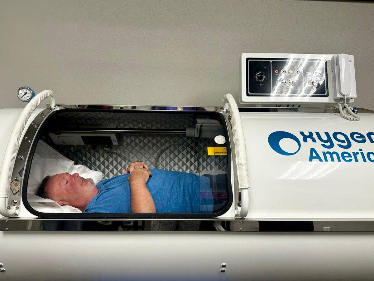 Veteran Rob James said hyperbaric oxygen treatments help him deal with aches and pains from a decade of military service. (Darlene McCormick Sanchez/The Epoch Times)
