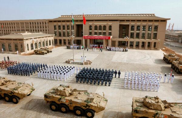 Chinese People's Liberation Army personnel attending the opening ceremony of China's new military base in Djibouti on Aug. 1, 2017. (STR/AFP via Getty Images)