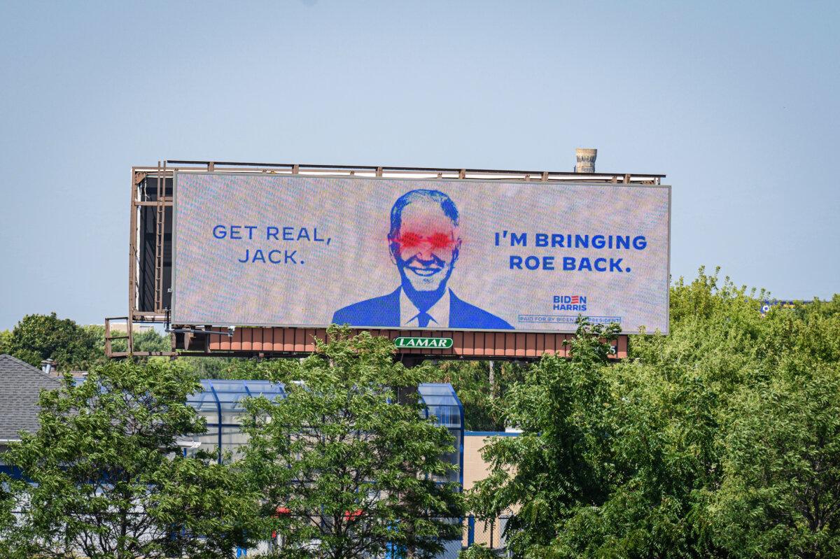 The Biden–Harris 2024 campaign and Democratic National Committee launches billboards, a plane banner, and a mobile billboard truck highlighting positions of Republicans and President Biden's accomplishments in Milwaukee, Wis., on Aug. 23, 2023. (Daniel Boczarski/Getty Images for DNC)