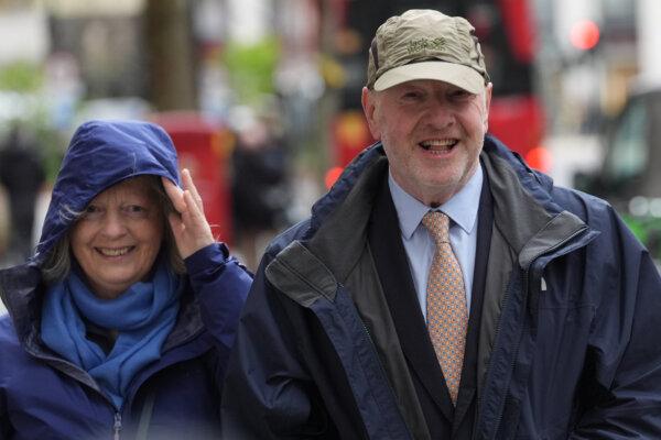 Former subpostmaster and lead campaigner Alan Bates (R) and his wife Suzanne Sercombe (L) arrive at the Post Office Horizon IT Inquiry at Aldwych House, central London, on April 6, 2024. (Stefan Rousseau/PA Wire)