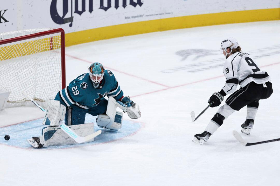 Sharks Blow Two-Goal Lead, Lose to Flames in Overtime