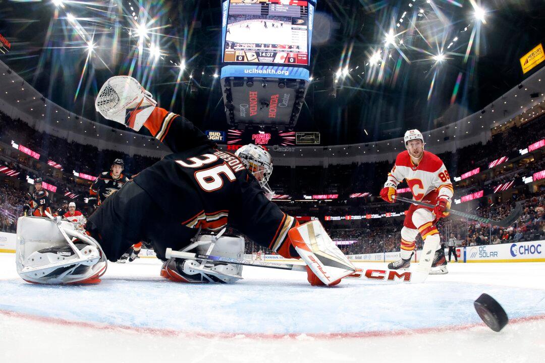 Andrei Kuzmenko’s Hat Trick Lifts Flames Over Ducks