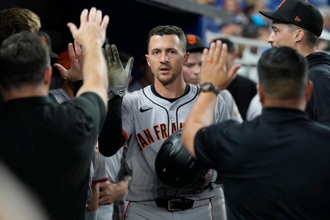 Late Rally Gives Giants Victory Over Frustrated Marlins