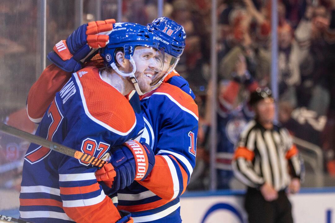 McDavid Reaches Historic 100-Assist Mark as Oilers Blast Sharks