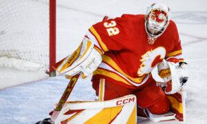 Wolf, Flames Beat Sharks in NHL-First Game Matching California-Born Goalies