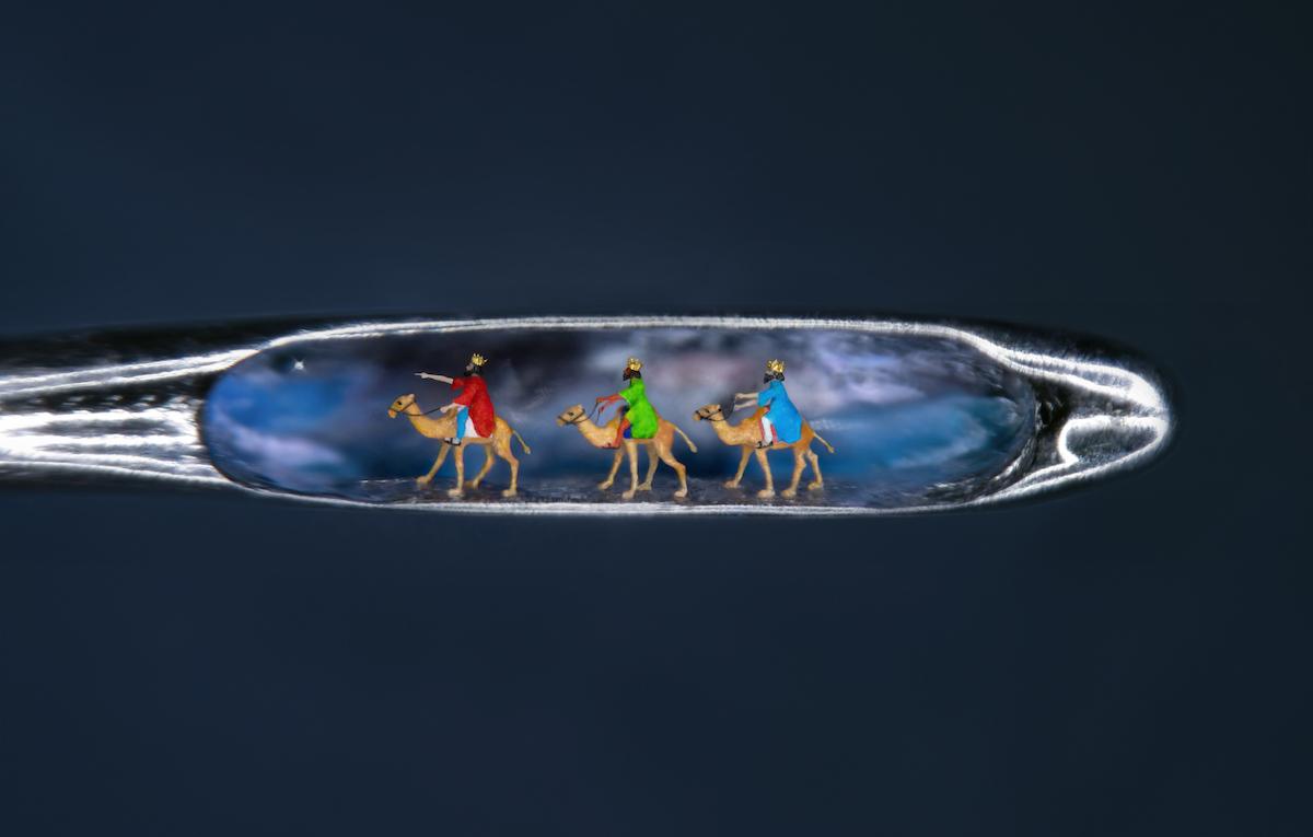 Mr. Wigan worked around 16 hours a day over four weeks to sculpt "The Three Little Kings" inside the eye of a needle. (Courtesy of Paul Ward Photography via Willard Wigan)