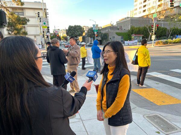Kerry Huang, one of the event organizers, in front of the Chinese Consulate at 1450 Laguna St. in San Francisco on April 20, 2024. (Steve Ispas/The Epoch Times)