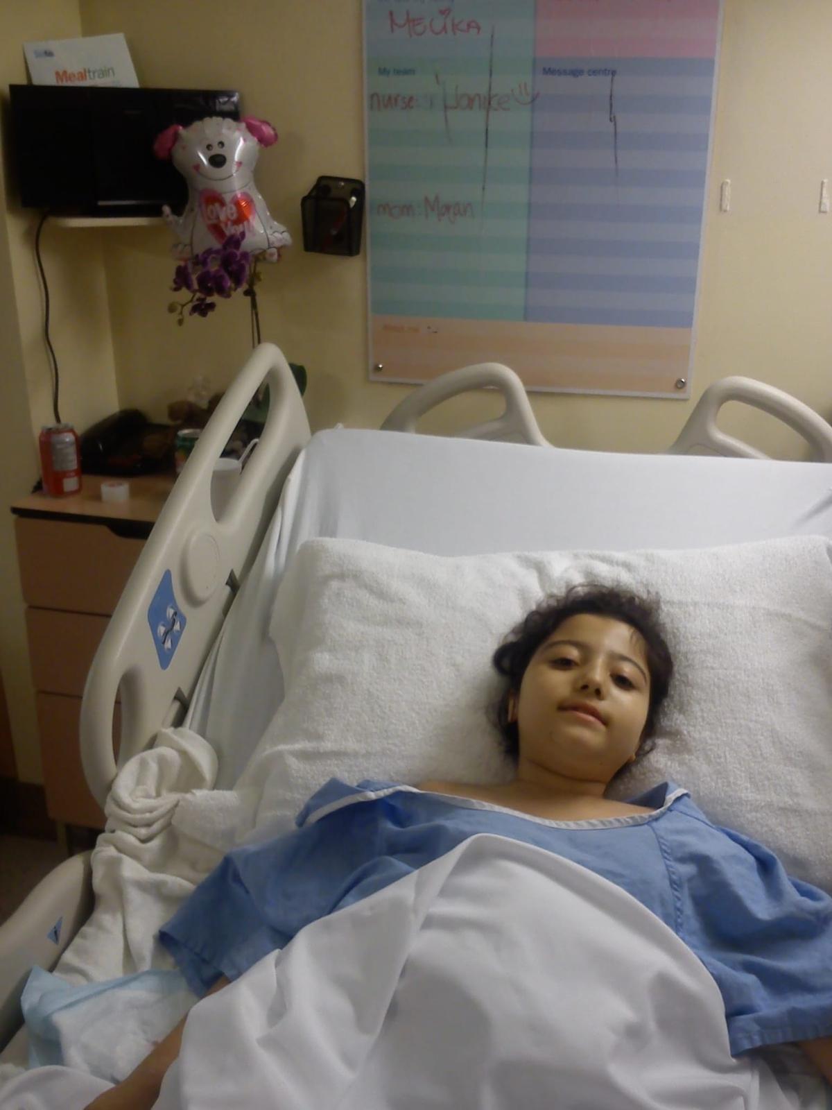 Melika Ghanaati in hospital when she was younger. (SWNS)