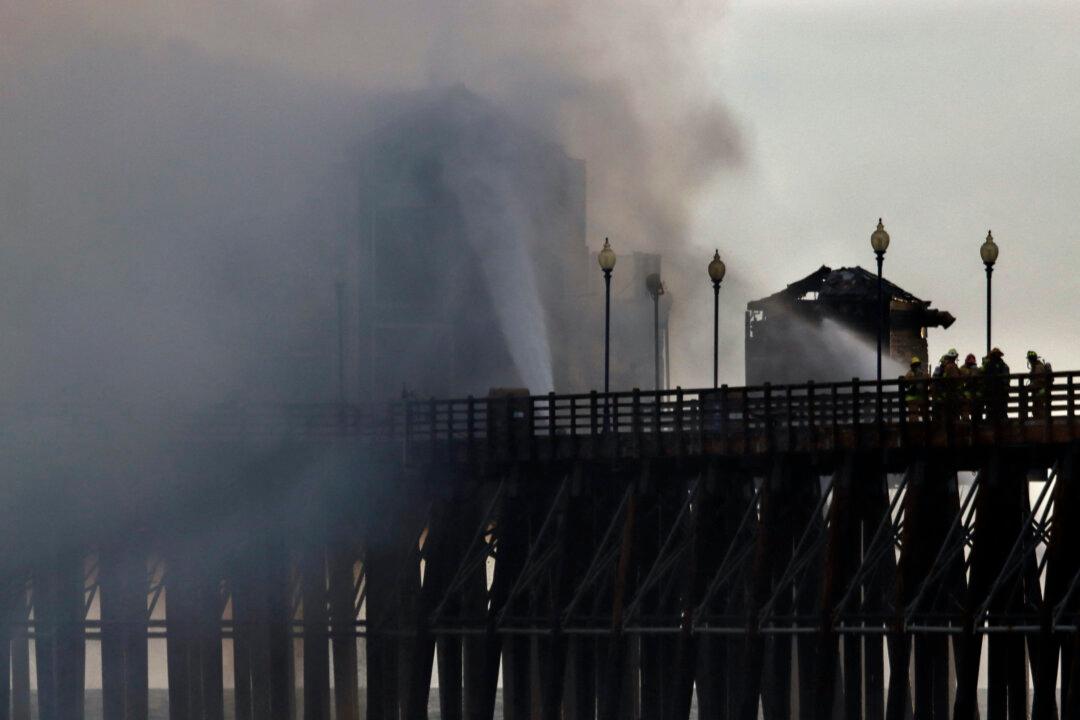 Crews Douse Hot Spots on Fire-Ravaged Oceanside Pier