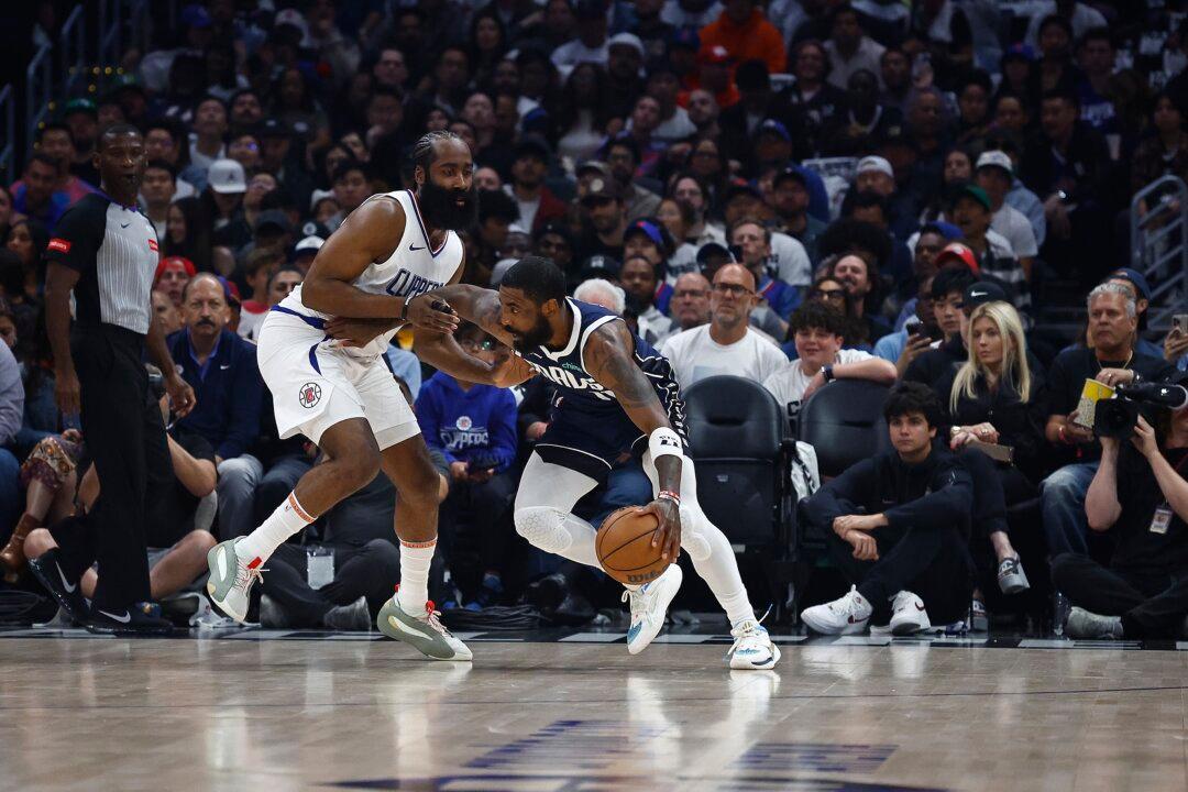 Luka Doncic and Kyrie Irving Carry Mavs Past Clippers 114–101 to Advance to Second Round