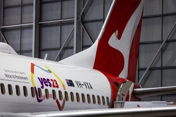 A Qantas Airways plane is decorated with the logo of the 'Yes' campaign for the Voice referendum in Sydney, Australia, on Aug. 14, 2023. (David Gray/AFP via Getty Images)