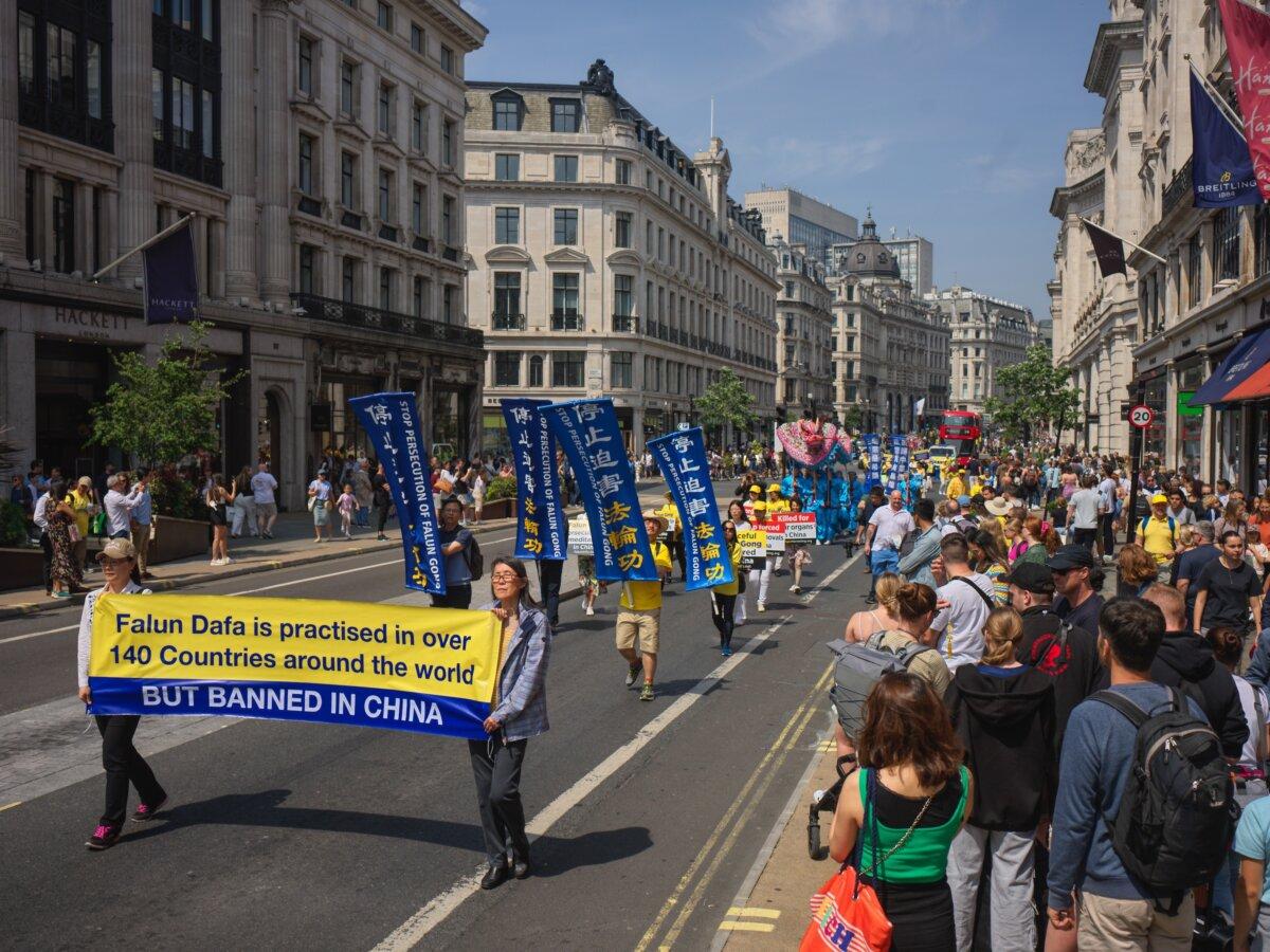 Falun Gong practitioners celebrating the World Falun Dafa Day in an event held in London on May 11, 2024. (Yanning Qi/The Epoch Times)