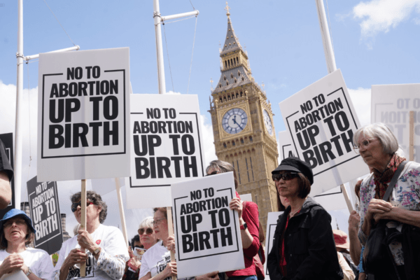 Pro-life groups demonstrate outside the Houses of Parliament, to protest against attempts to amend the Criminal Justice Bill to decriminalise abortion in Westminster, London, on May 15, 2024. (Lucy North/PA Wire)